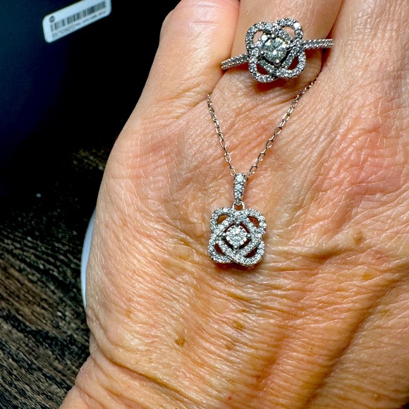 10 k white gold and diamond ring and necklace